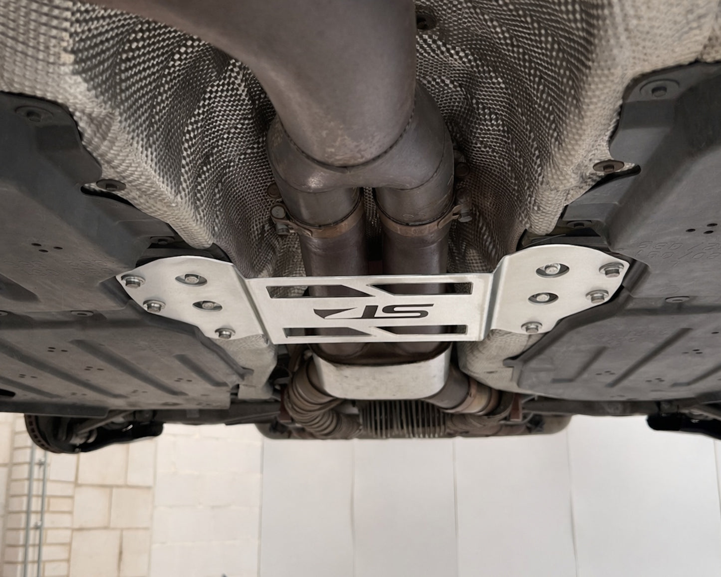 BMW G8x Lower Chassis Exhaust Brace Bracket